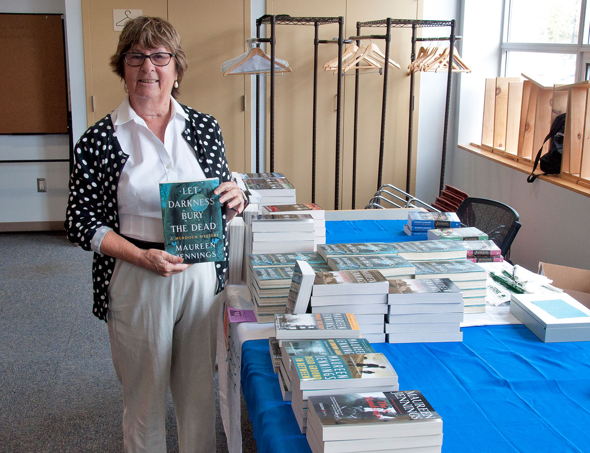 Maureen Jennings with her new book